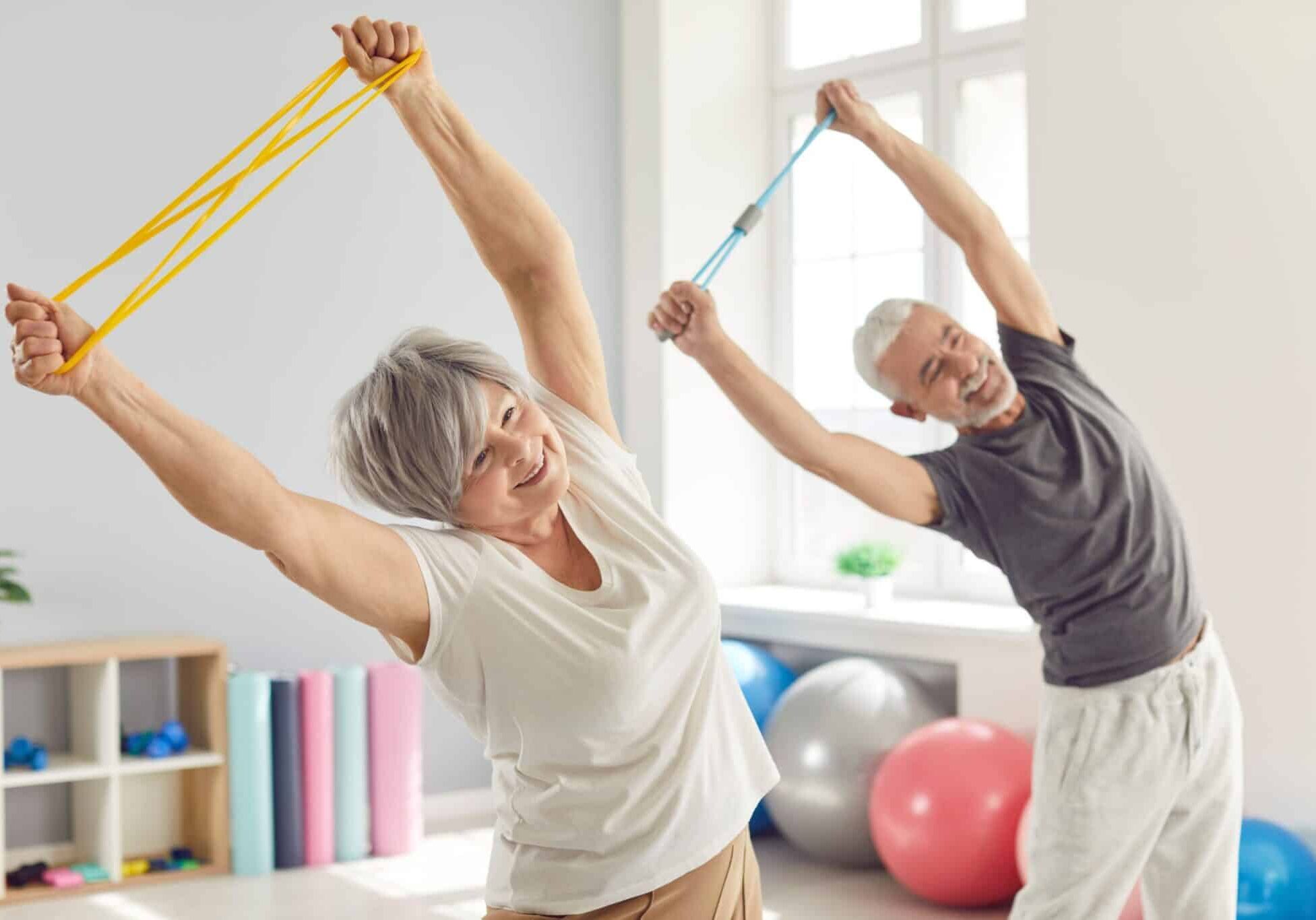 Older Womanman Stretching W Bands Scaled